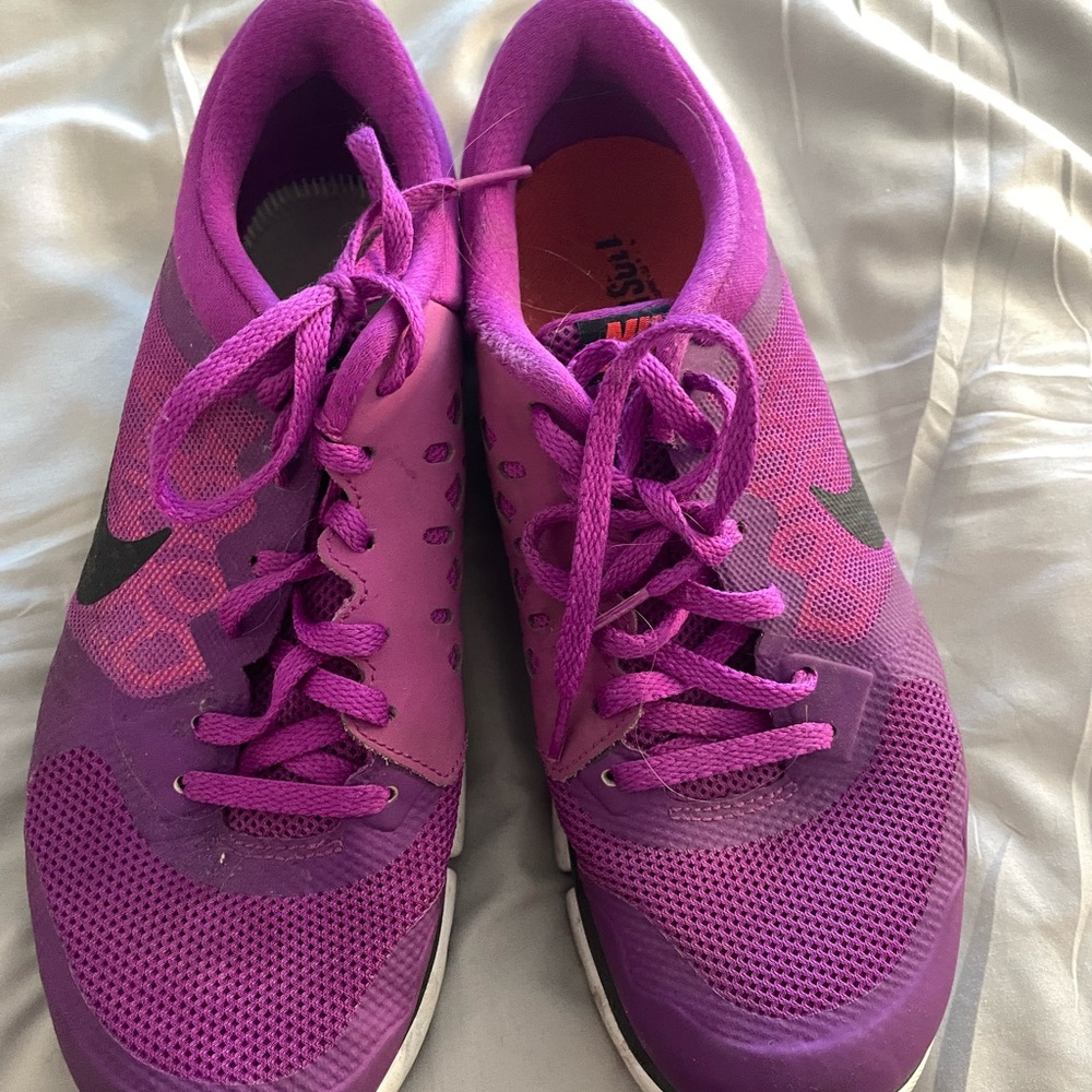 Bright purple Nike shoes